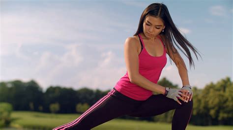 Asian Woman Stretching Legs Outdoor Fitness Stock Footage SBV-312734837 - Storyblocks