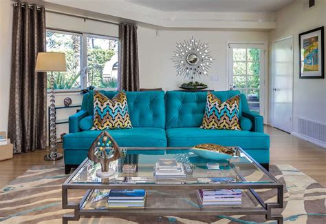 traditional style teal living room decor with teal velvet tufted sofa