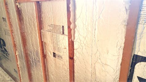 Installing Foam Board Insulation Between Studs