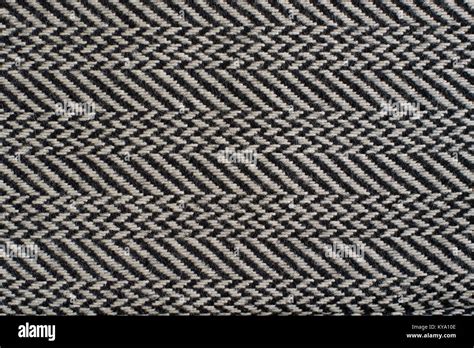 Herringbone (Broken Twill Weave) - a distinctive V-shaped weaving pattern. Closeup. Grey ...