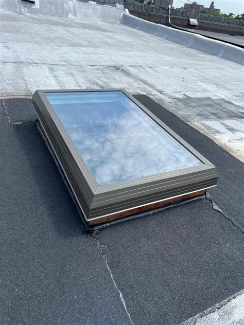 Project: New Flat Roof Skylight Installation in New Rochelle | RH Renovation NYC