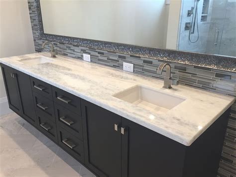 White Granite Double Vanity Sink With Modern Black Cabinets and Large Mirror | Granite bathroom ...