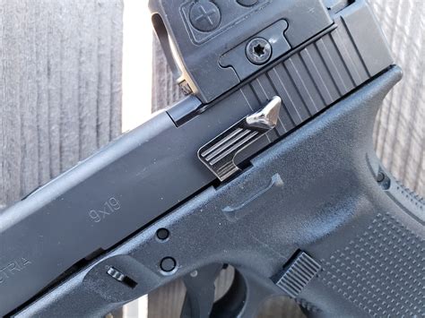 Kagwerks Extended Glock Slide Release Review - AmmoLand Shooting Sports News