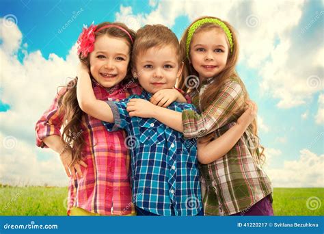 Cute Fashion Kids Hugging Each Other. Stock Image - Image: 41220217