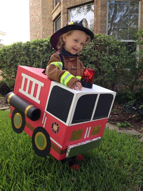 The perfect firefighter costume - complete with fire engine! Fireman Party, Firefighter Birthday ...