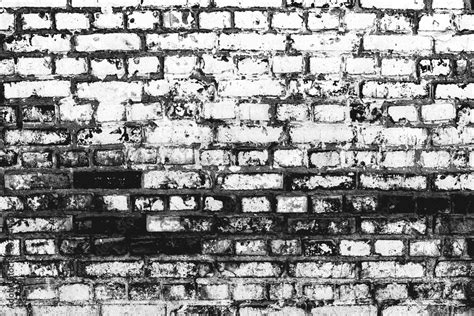 Texture of a brick wall with cracks and scratches Stock Photo | Adobe Stock