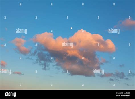 evening sky with clouds and moon Stock Photo - Alamy