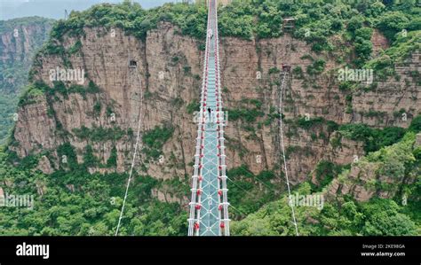 Aerial photos show the world's longest glass suspension bridge - Hongyagu Glass Suspension ...