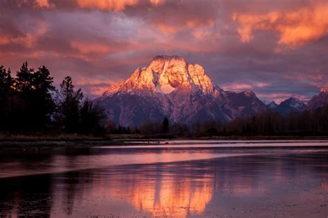 America's Great Outdoors, Sunrise at Grand Teton National Park looks...