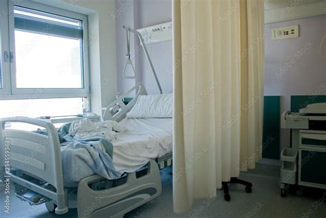 view of hospital room, electronic bed with sheets for a patient, hygiene, medicine, doctor ...