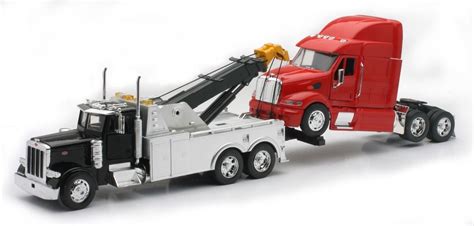 Buy New Ray SS-12053 Toys 1: 32 Scale Peterbilt Tow Truck with Red Peterbilt Cab Semi Truck ...