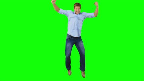 Young Man Jumping On Green Screen In Slow Motion Stock Footage Video 4049944 - Shutterstock