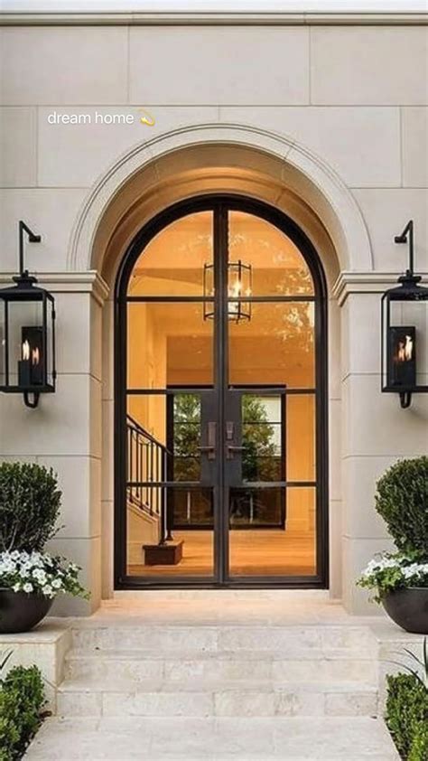 Dream Home Entrance with Potted Plants and Lights