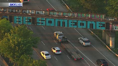 Houston's iconic 'Be Someone' graffiti returns to overpass after months - ABC13 Houston