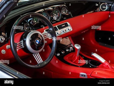 red interior car bmw - Myong Yost