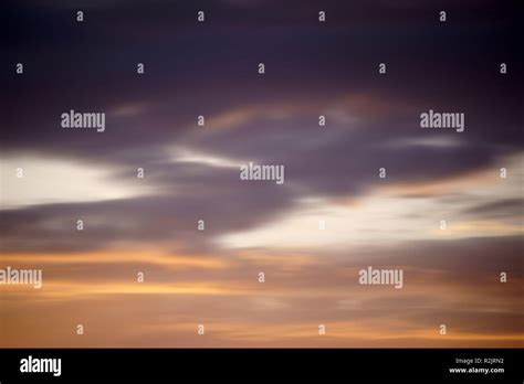 A cloudy evening sky with colorful clouds Stock Photo - Alamy