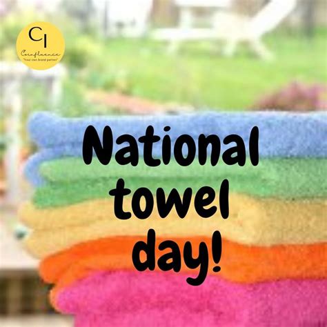 a stack of towels with the words national towel day written on them in black letters