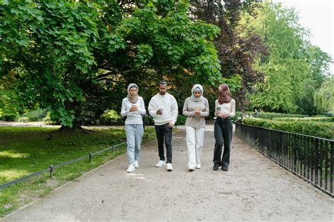 Group of Friends Walking in the Park · Free Stock Photo