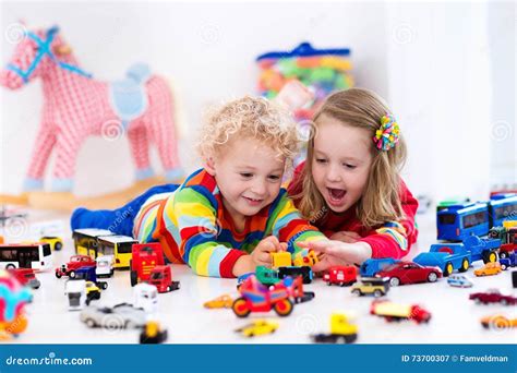 Little Kids Playing with Toy Cars Stock Image - Image of child, fire: 73700307