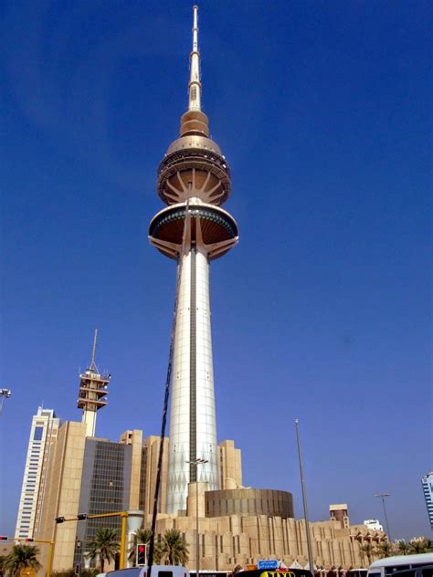 a very tall tower with a sky scraper in the middle of it's center