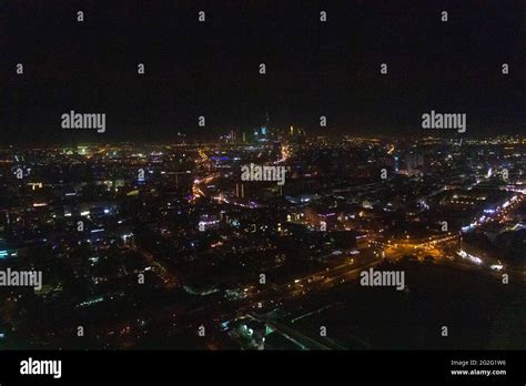 Aerial night view of Dubai Skyline under dark Sky, Dubai Downtown Residential and Business ...