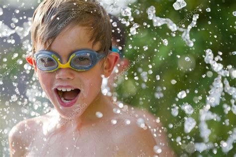 Child playing in the water — Stock Photo © chrisroll #6921982