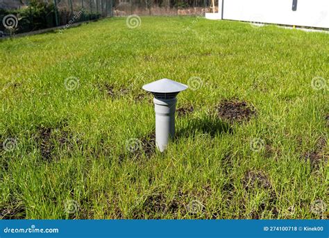 A Gray Vent Pipe from a Household Septic Tank without a Drain Located in the Garden. Stock Photo ...