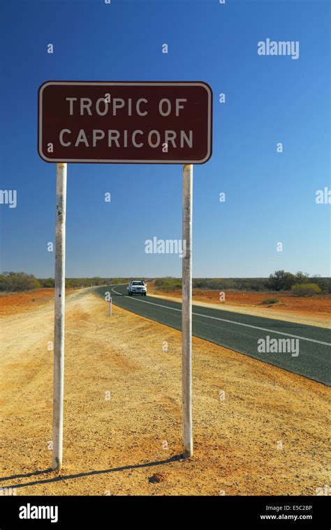 Tropic of Capricorn sign on highway near Exmouth, Western Australia Stock Photo - Alamy