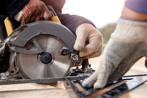 Builder Uses Portable Circular Saw Tool To Cut Wood Stock Image - Image of carpentry, background ...