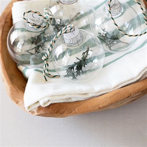 Easy DIY Glass Ornaments With Evergreen