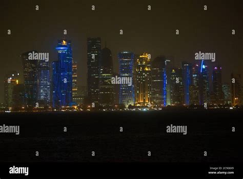 Doha skyline by night, Qatar Stock Photo - Alamy