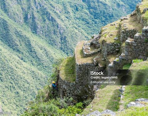 Workers At Inca Site Machu Picchu Peru Preventing Erosion Stock Photo - Download Image Now - iStock