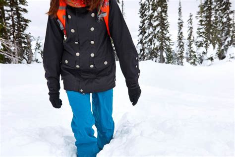 Woman in Outdoor Clothing Walking Stock Photo - PixelTote