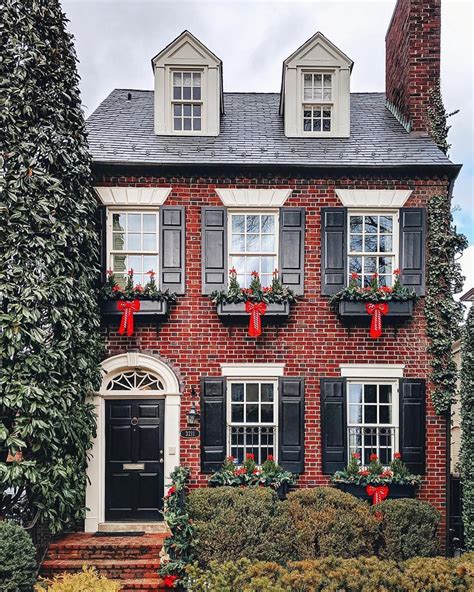 Red Brick House With Black Shutters, black shutters and door with dark gray roof!, Detail of a ...