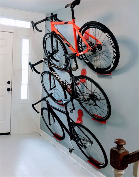 Multiple bikes hanging rack system. DaHANGER Dan pedal hook. | Bike wall storage, Bike storage ...