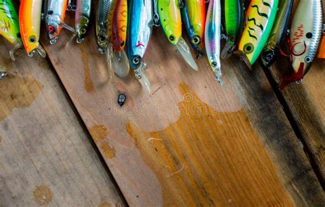 Various of Fishing Lure on Wet Wooden Background Stock Photo - Image of catch, macro: 144513500