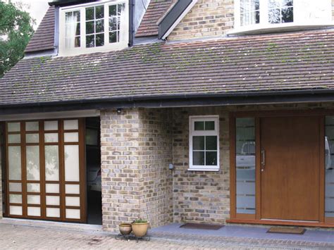 Side-sliding are the most original garage door designs in UK.