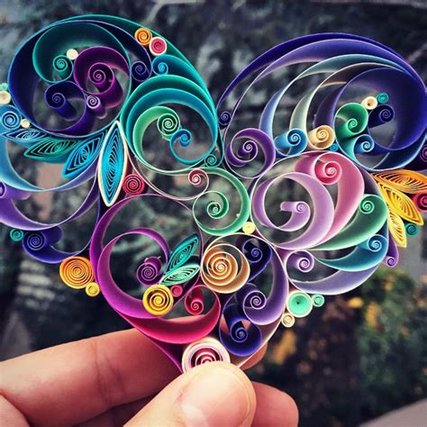 Sena Runa meticulously creates intricate designs using the art of paper quilling swirl-paper-art ...