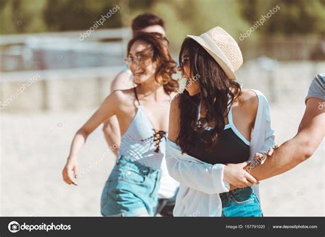 Friends walking at beach — Stock Photo © AllaSerebrina #157791020