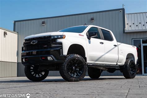 Lifted 2019 Chevy Silverado 1500 with 6 Inch Rough Country Suspension Lift Kit and 22×12 Fuel ...