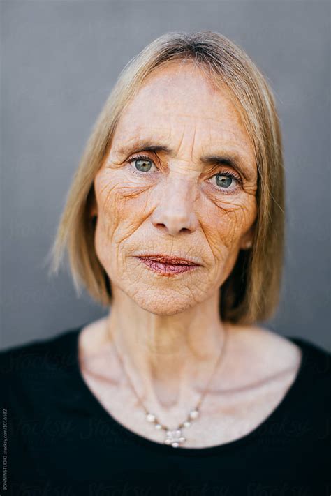 "Closeup Portrait Of A Wrinkled Senior Woman." by Stocksy Contributor "BONNINSTUDIO " - Stocksy