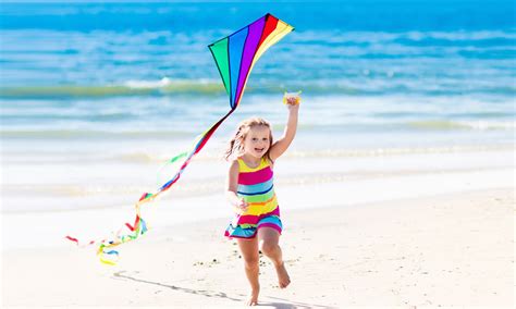 Fly a kite in the seaside breezes