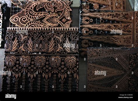 copper stamp batik fabric production Yogyakarta Indonesia Stock Photo - Alamy