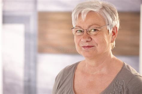 Portrait of Senior Woman with Glasses Stock Image - Image of camera, contact: 41198431