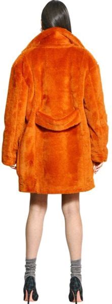 Msgm Eco Fur Coat in Orange | Lyst