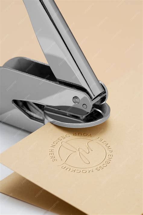 Premium PSD | Metallic stamp with embossed logo effect on paper