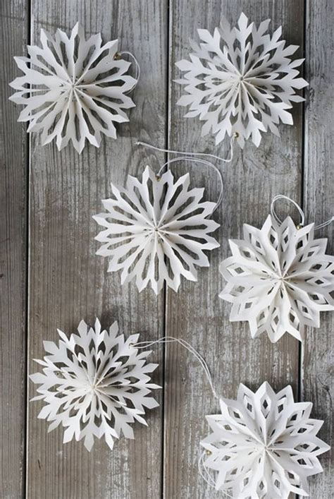 Nine Ways To Take Paper Snowflakes To The Next Level | Diy christmas garland, Diy christmas ...