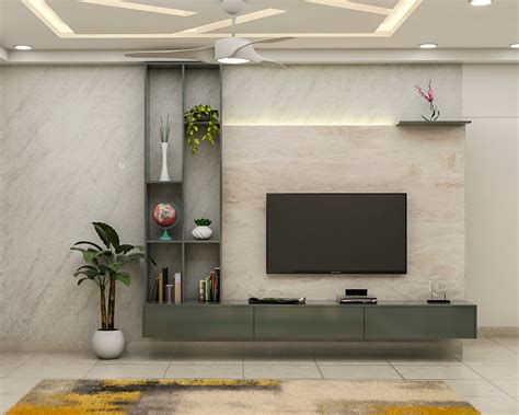 Modern TV Unit With Green Wall-Mounted Storage And Stone Backdrop | Livspace