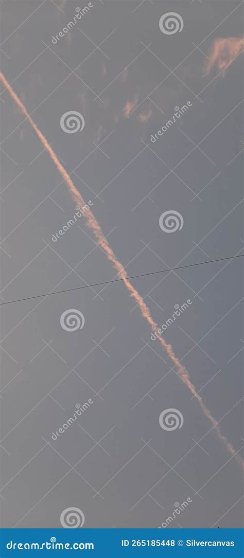 A Plane Trail in the Sky during Evening Stock Photo - Image of blue, airplane: 265185448