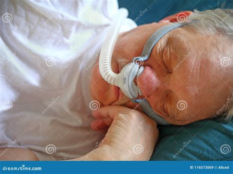 Man with Sleep Apnea Uses Breathing Device Stock Image - Image of closeup, person: 116573069